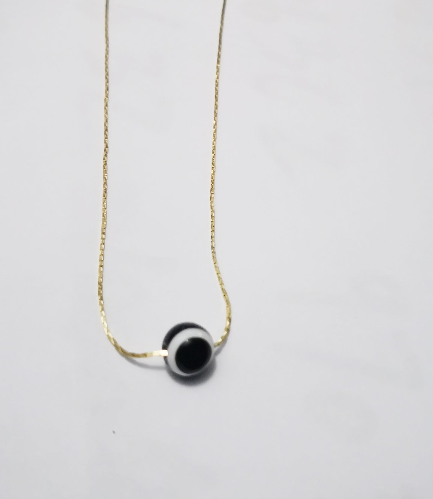 Collier pendentif œil maléfique en résine (or ou argent)